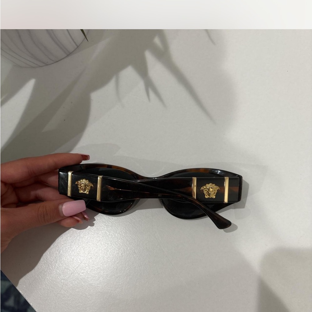 Versace Black and Gold Sunglasses with Elegant Design